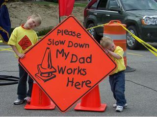 please slow down my dad works here work zone sign