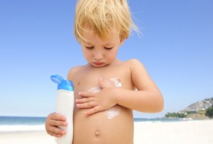 Child_Applying_Sunscreen_Beach_H